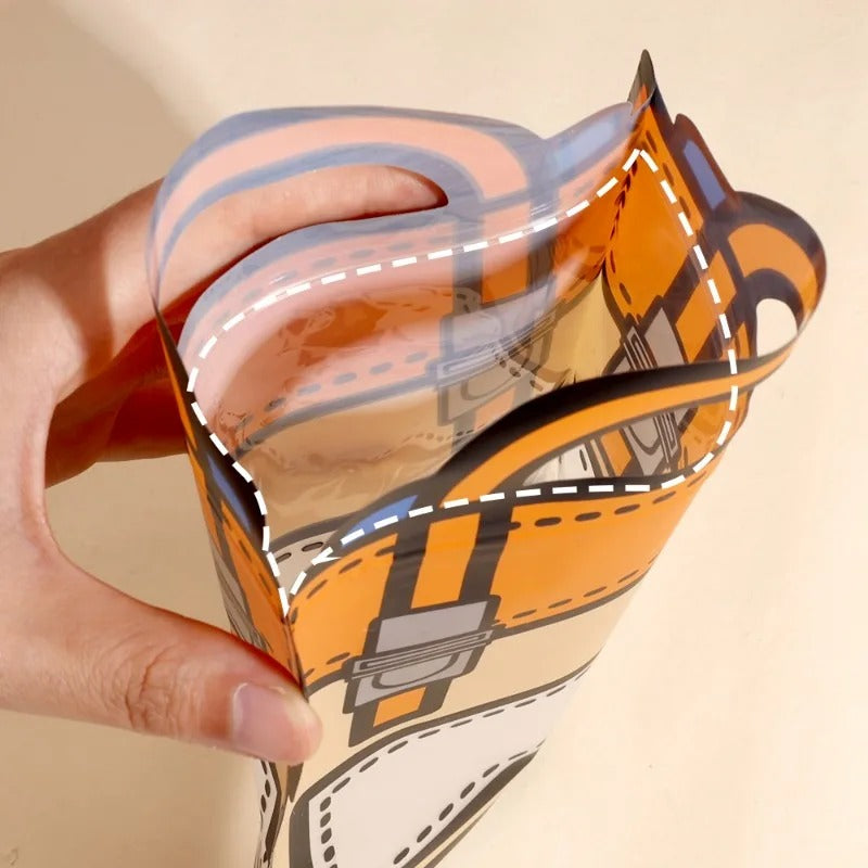 NIYO TOYS orange goody bag bags with a fun backpack design, ideal for birthday parties and age 3+
