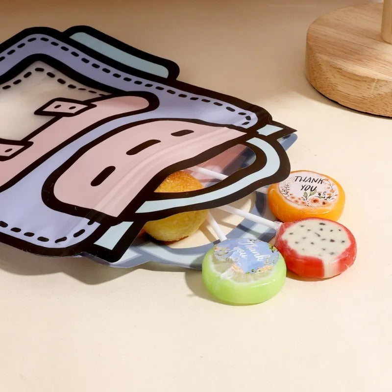 Colorful goody bag bags with playful design, perfect for kids' parties and age 3+ celebrations