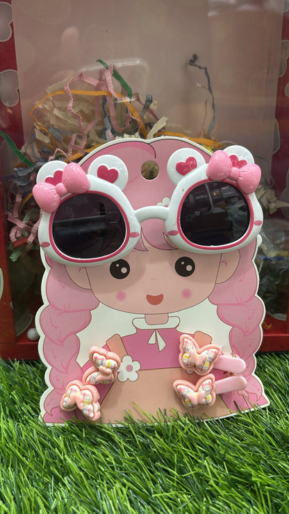 Pink heart-shaped sunglasses for kids with butterfly clips, ideal for stylish sun protection