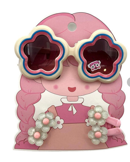 Flower-shaped sunglasses in pink and cream for kids, perfect for summer fun and outdoor play