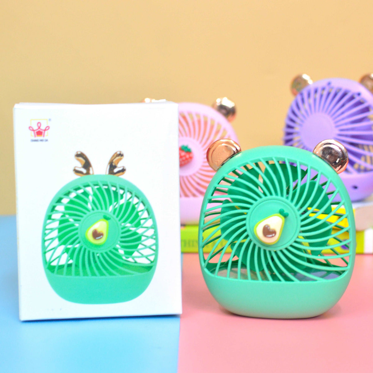 Green bear-shaped hand held fan for kids, perfect for warm days and outdoor fun