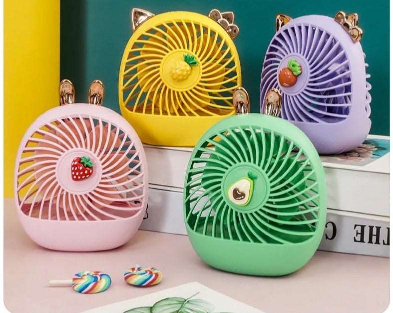 Colorful hand held fan in pastel shades with fruit designs, great for kids ages 3 and up