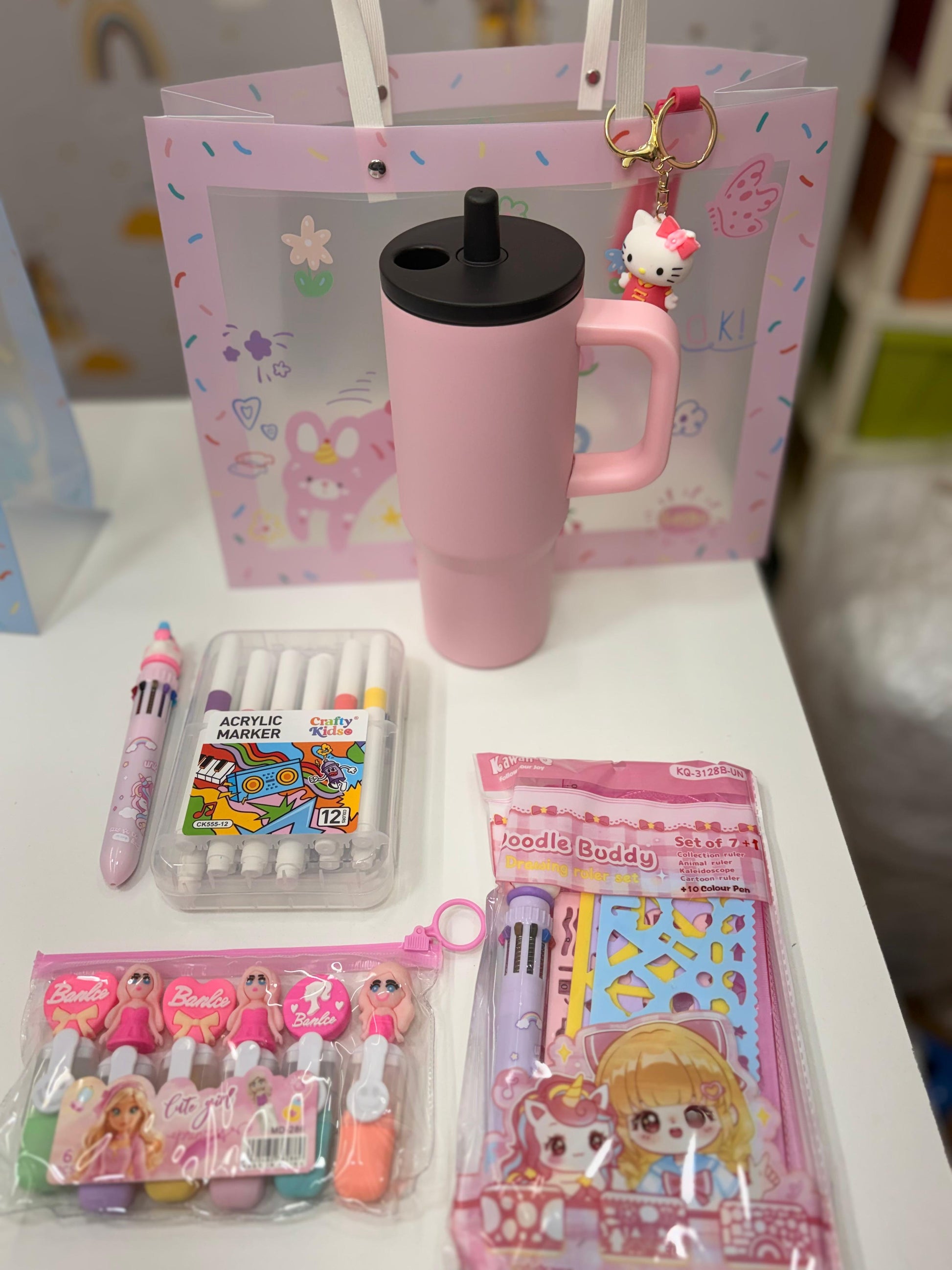 Hello Kitty pink hamper with colorful art supplies, age 3+, perfect for kids' organization and play