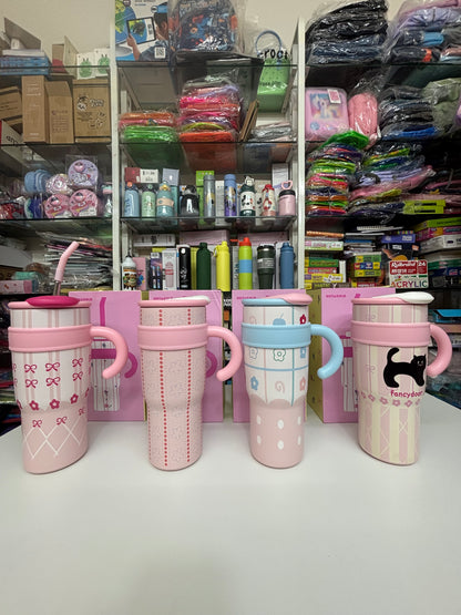 Set of four pink insulated coffee mugs with fun patterns, ideal for kids aged 3 and up, perfect for beverages