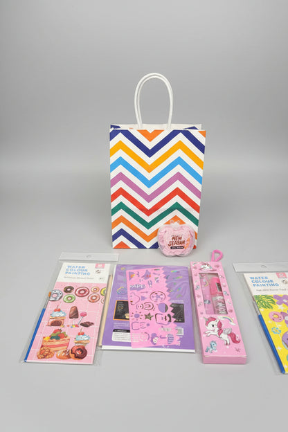 Colorful NIYO TOYS gift hamper with stickers, accessories, and a fun bag, perfect for creative age 6+ kids, ideas for gift hamper