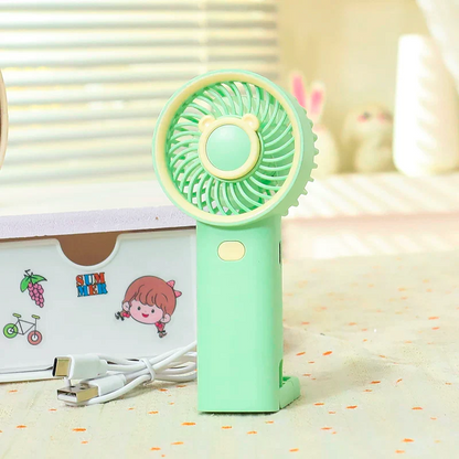 NIYO TOYS mint green rechargeable fan for kids, perfect for summer use and portable enjoyment