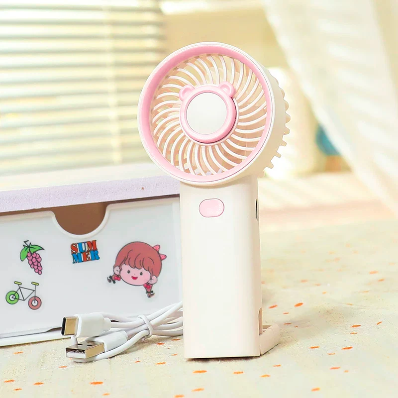 NIYO TOYS rechargeable fan in pink and white, perfect for kids, portable for summer use