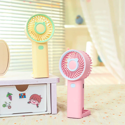NIYO TOYS rechargeable fan in pastel yellow and pink, perfect for kids aged 3+ during summer adventures