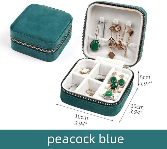 Peacock blue jewelry case for travel with multiple compartments for organizing accessories.