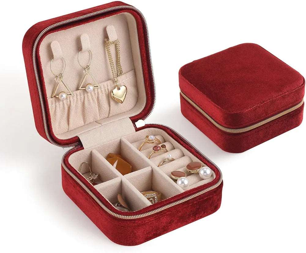 Red velvet jewelry case for travel with organized compartments for earrings and rings
