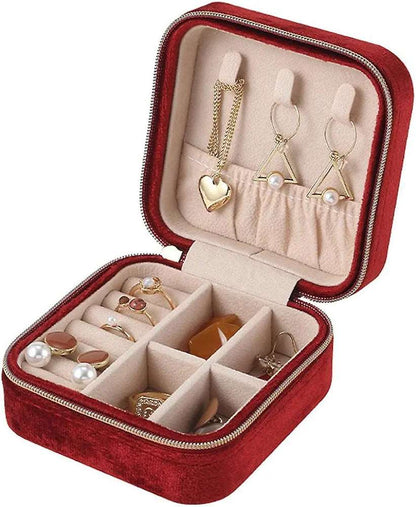 Red velvet jewelry case for travel with multiple compartments for organizing earrings and rings