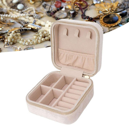 Beige NIYO TOYS jewelry case for travel with multiple compartments for organized storage of accessories