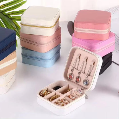 Colorful NIYO TOYS jewelry organizer featuring compartments for rings and earrings, perfect for ages 3 and up