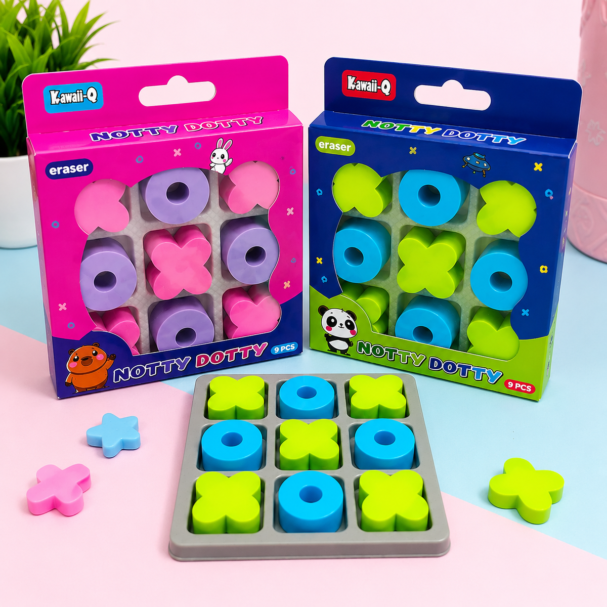 Colorful tac tic toe eraser set for ages 3+, featuring panda and unicorn designs in pink and green