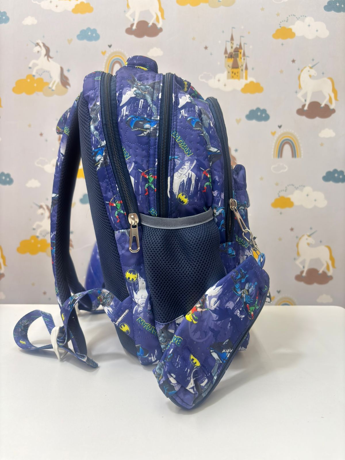 Navy kids backpack featuring colorful unicorns and castles, perfect for ages 3 and up, ideal for school or outings