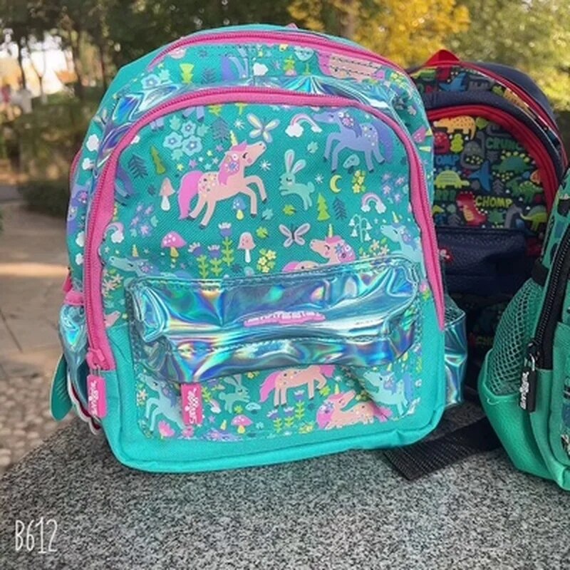 Colorful kids backpack featuring unicorns and floral patterns, ideal for ages 3 and up for school use