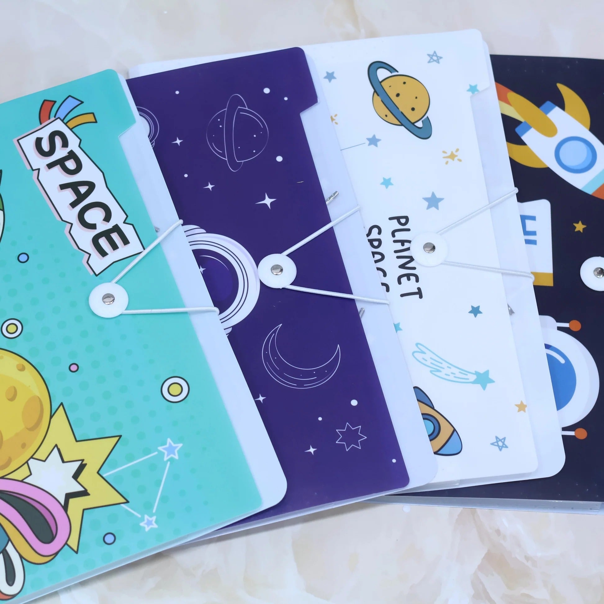 NIYO TOYS space theme file folders for kids with colorful planets and rocket designs