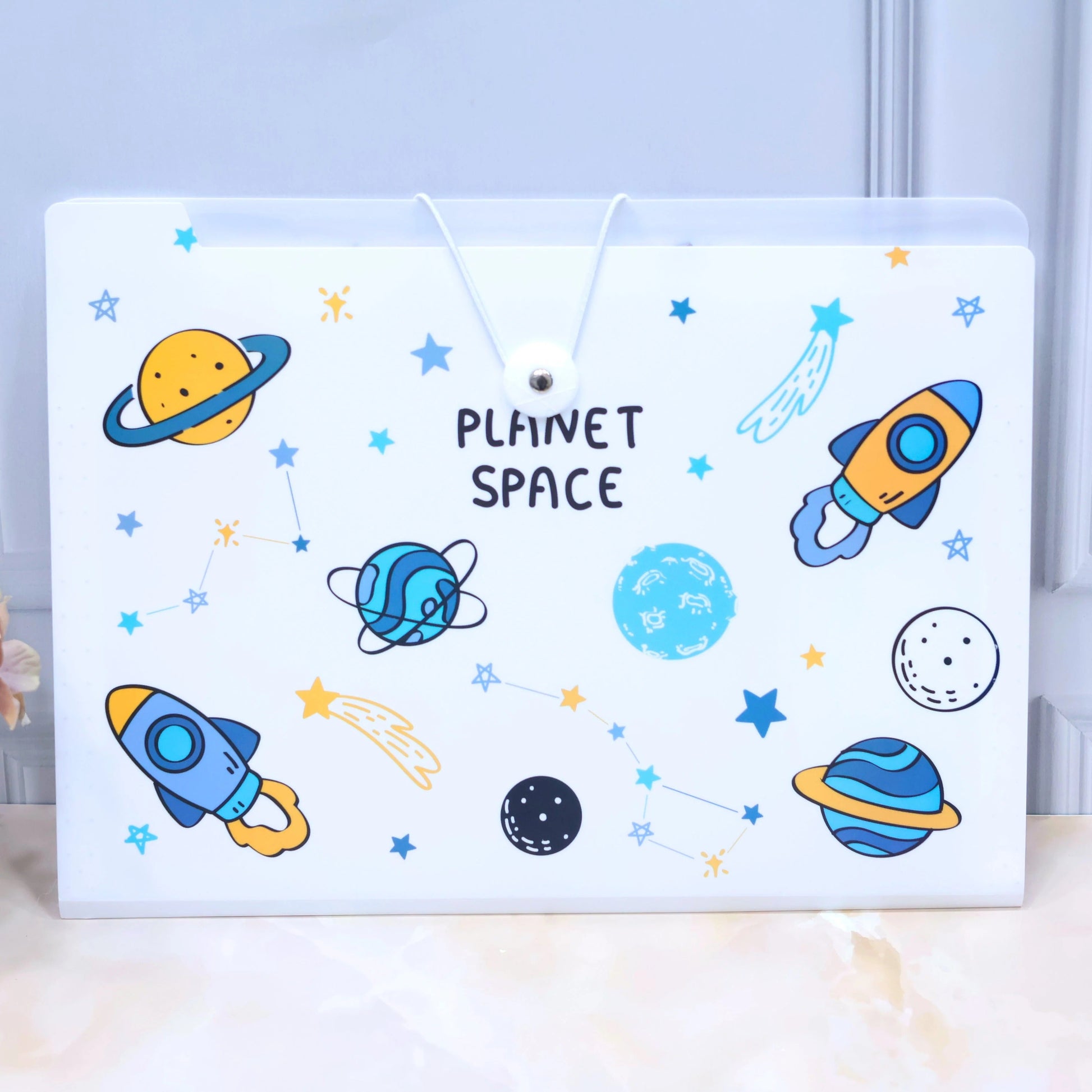 NIYO TOYS space theme file folders for kids with colorful planets, rockets, and stars design