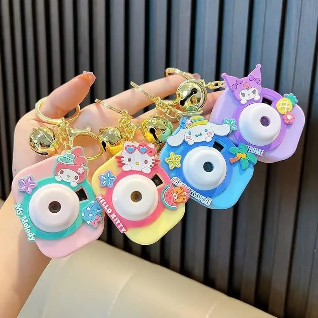 Colorful Kodak camera keychain set featuring Hello Kitty designs, great return gift for children age 3 and up
