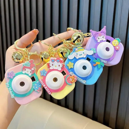 Colorful Kodak camera keychain set featuring Hello Kitty designs, great return gift for children age 3 and up