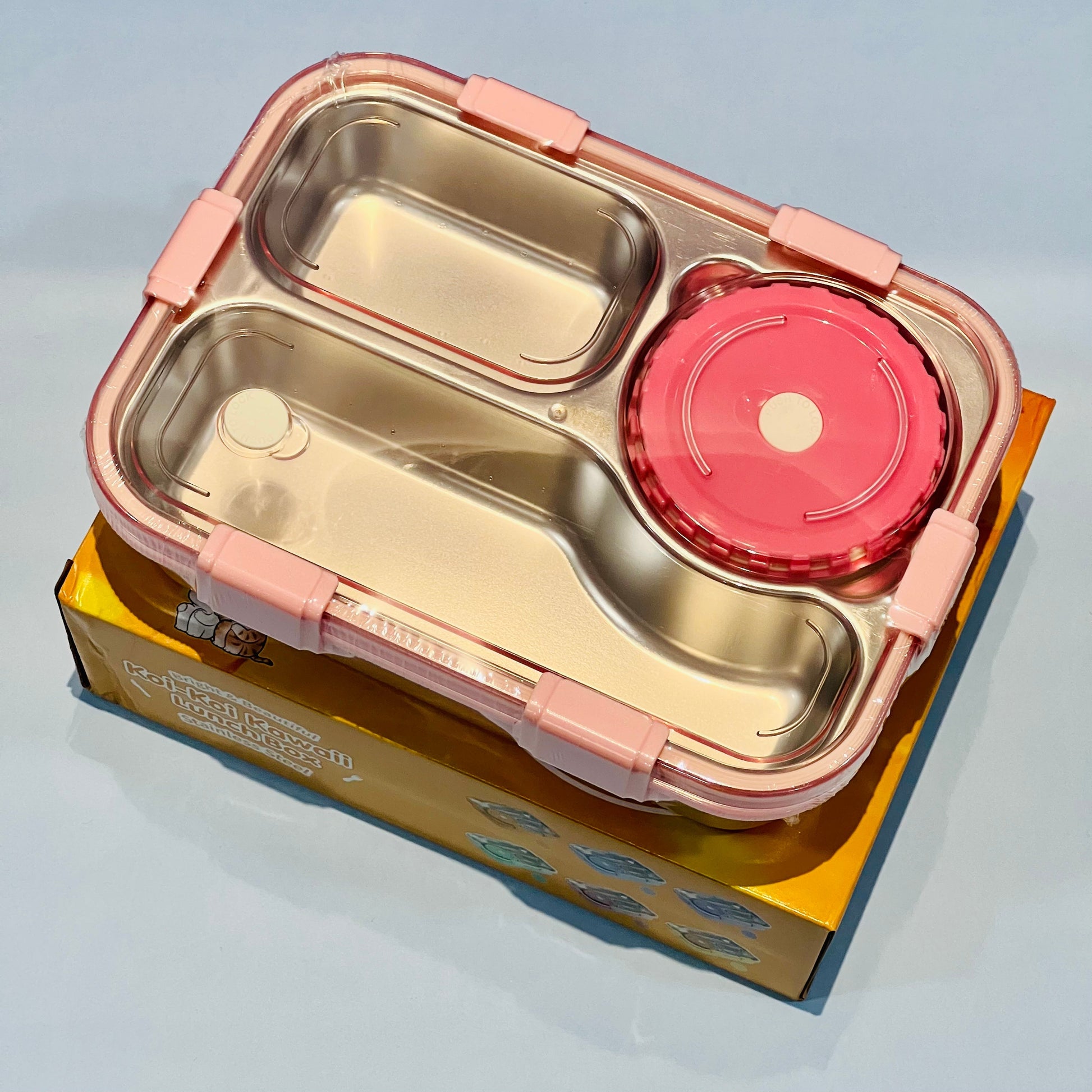 NIYO TOYS Korean bento box for kids with multiple compartments and a pink lid for easy meal organization