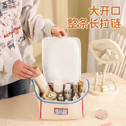 NIYO TOYS Jelly Bag in white and blue, perfect for organizing cosmetics and toiletries, age 3 and up
