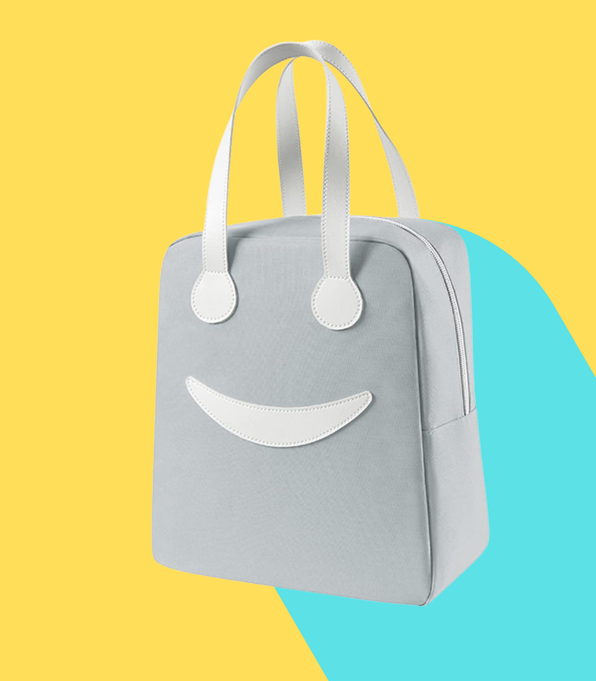 Gray lunch bag with a smiley face design, perfect for children ages 3 and up for school or outings