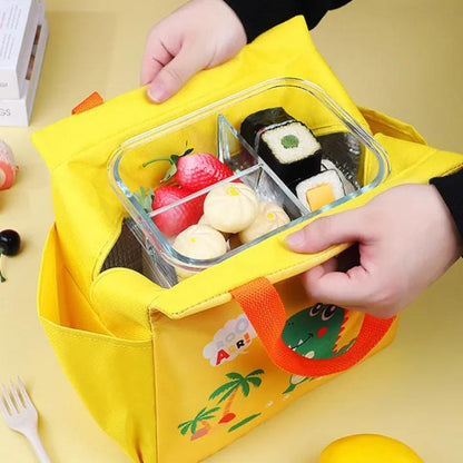 Yellow NIYO TOYS lunch bag Stanley with a clear container holding sushi and fruit, perfect for kids