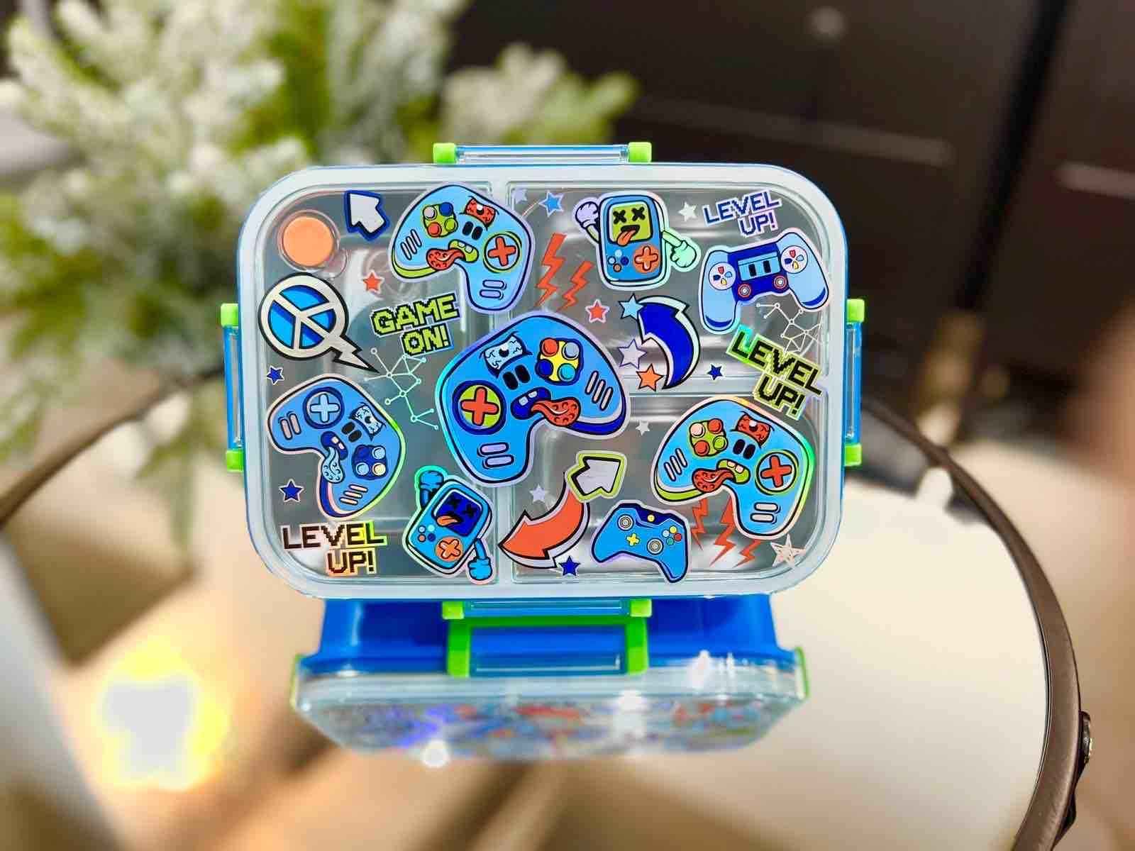 Colorful NIYO TOYS luxury lunchbox for kids with gaming stickers and vibrant design