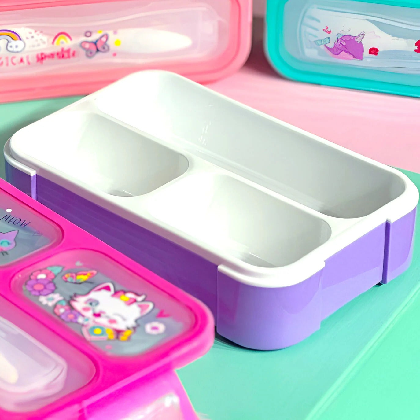 NIYO TOYS mini bento lunch box for kids in purple and pink with playful designs and dual compartments