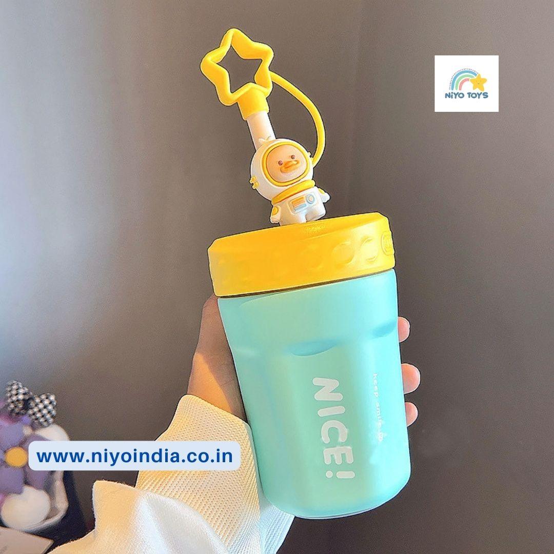 Colorful NIYO TOYS stainless steel mug for kids with a fun star-shaped straw and playful design