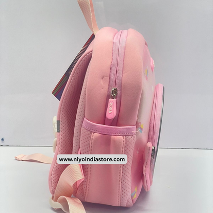Side view of a pink 3D unicorn backpack for kids with colorful designs and adjustable straps