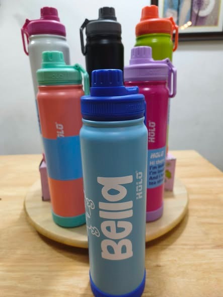 Owala water bottle in blue with Bella design, perfect for kids and adults on the go