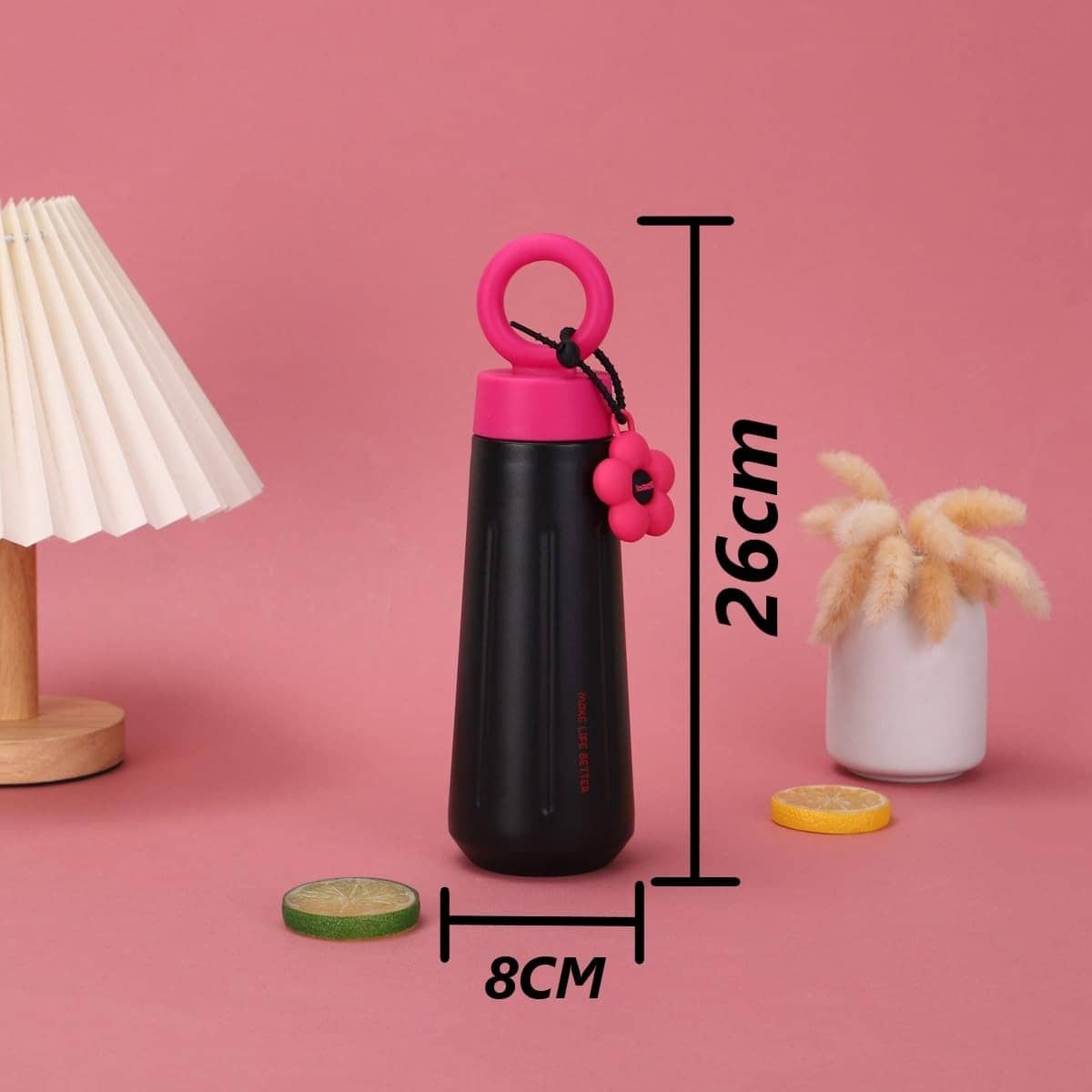 Owala water bottle in black with pink cap and flower charm, perfect for kids and adults on the go