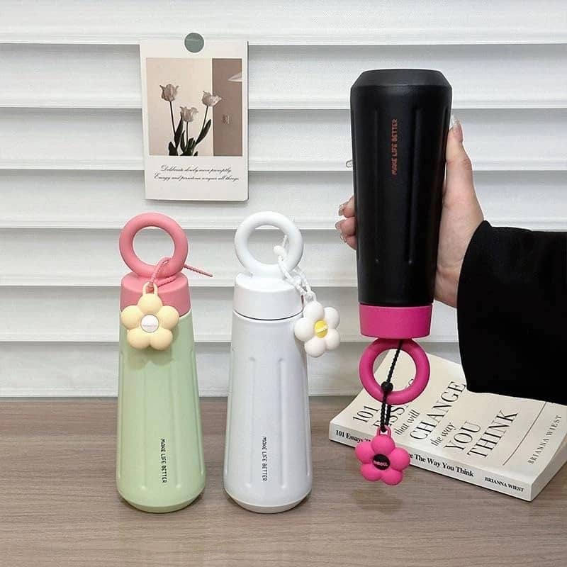 NIYO TOYS Owala water bottle in green, white, and black, perfect for ages 3+, ideal for staying hydrated