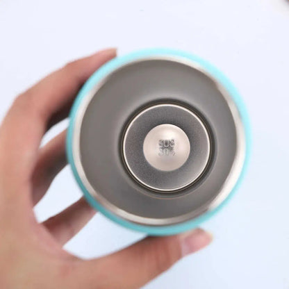 Owala water bottle in teal color, perfect for keeping drinks cold, ideal for all ages