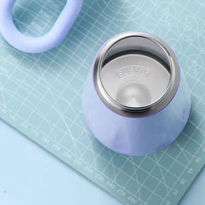 Light purple Owala water bottle with stainless steel interior, designed for kids age 3+, perfect for school or sports