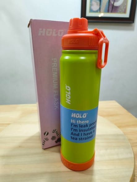 Owala water bottle in bright green and orange, designed for kids and adults, ideal for hydration on the go