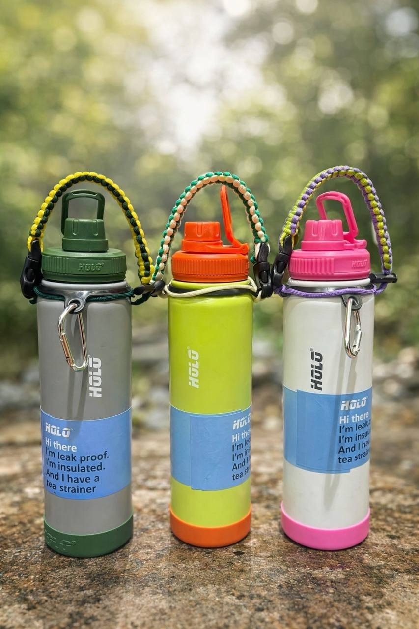 Three colorful Owala water bottles for kids, age 5+, leak-proof design with built-in strainer