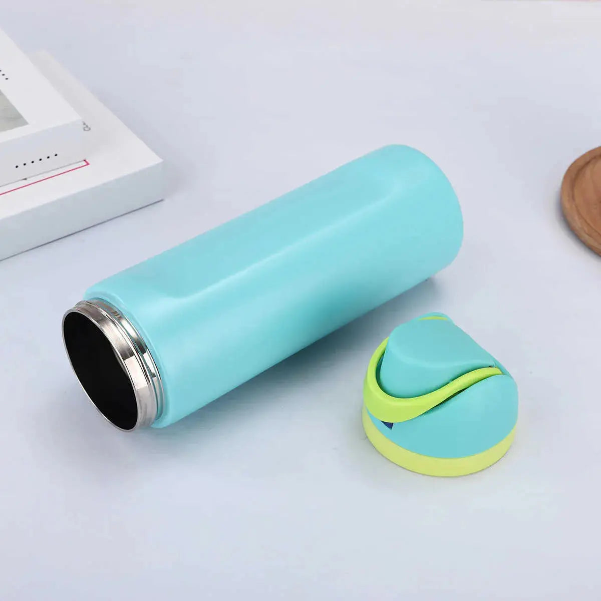Light blue Owala water bottle with a secure lid, perfect for kids and adults, ideal for hydration on the go