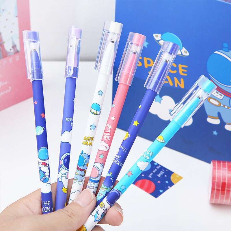 Assorted NIYO TOYS gel pens in blue, pink, and white, age 5+, ideal for creative writing and drawing