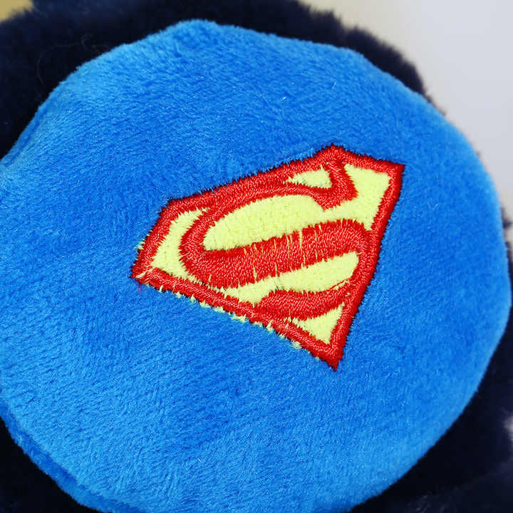 Superman-themed plush earmuffs in blue, perfect for kids ages 3 and up, ideal for winter warmth