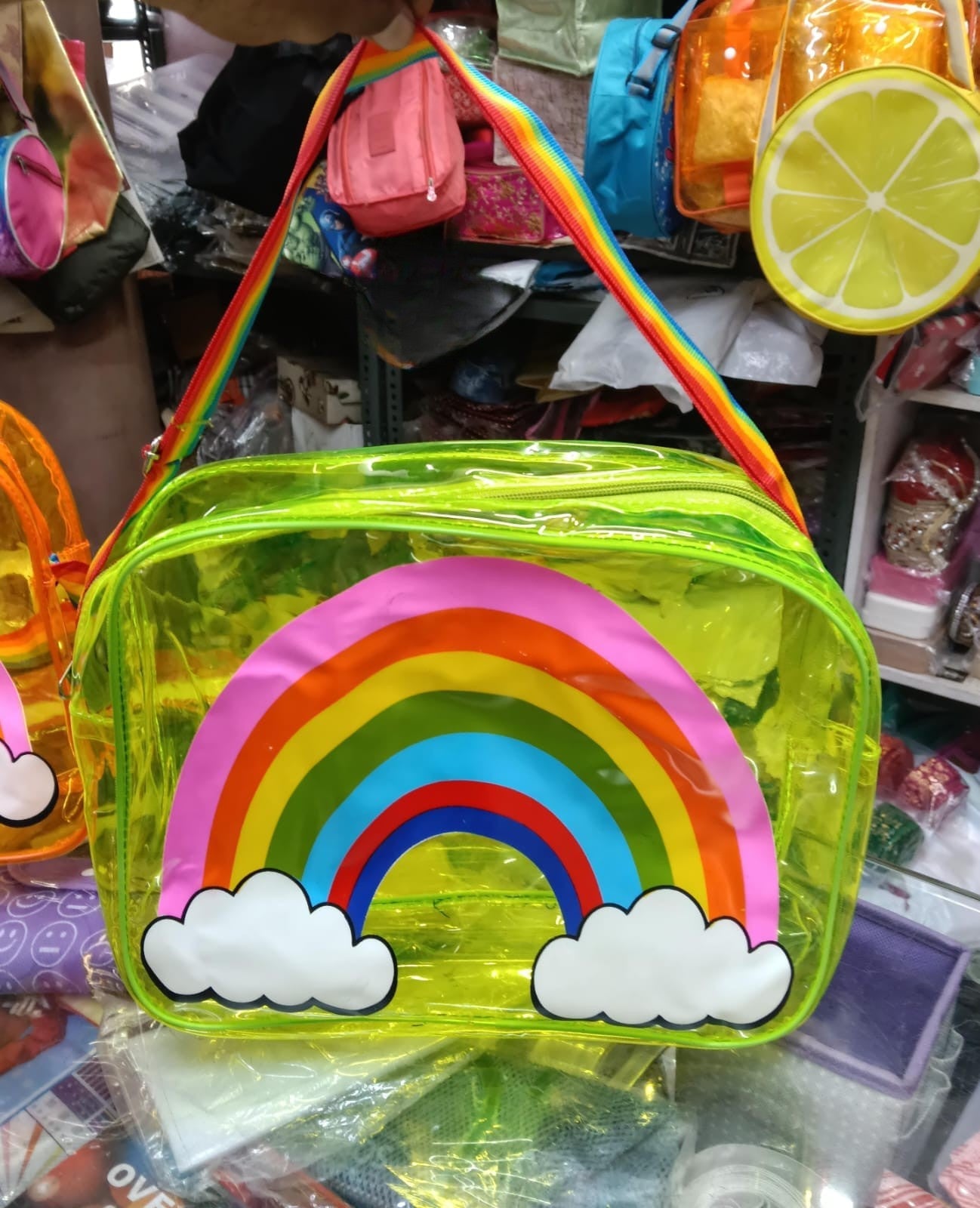 Colorful NIYO TOYS rainbow jelly bag for kids with a vibrant rainbow and cloud design