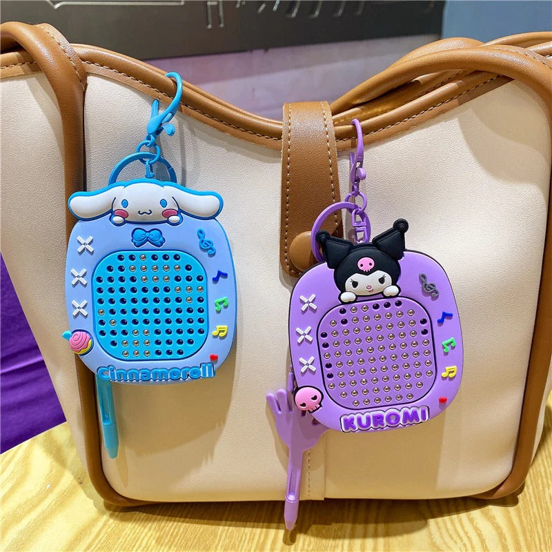 Colorful keychain set featuring Cinnamoroll and Kuromi, ideal for kids ages 3+, perfect for return gifts
