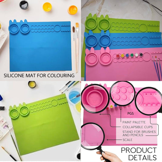 Silicone art mat for kids in blue, pink, and green with compartments for coloring supplies