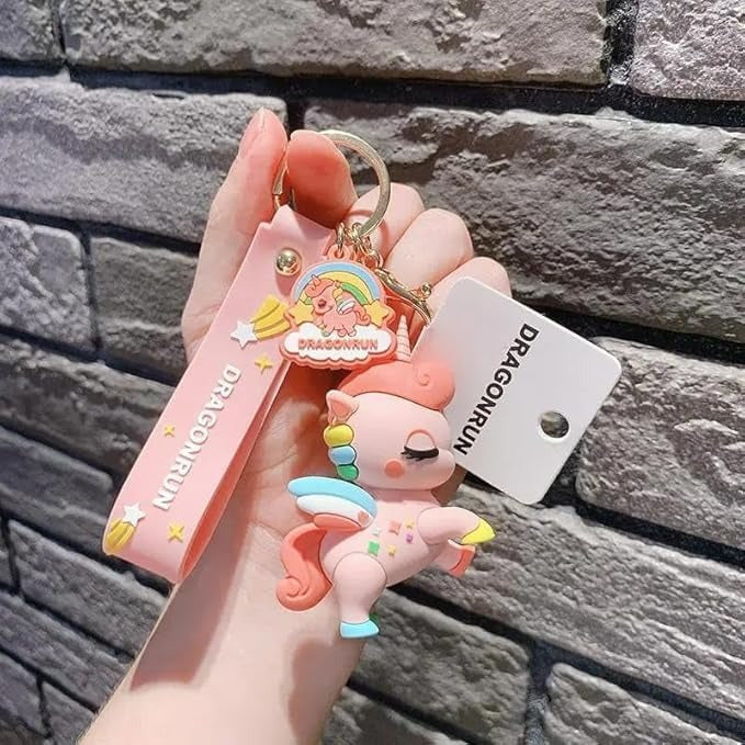 Cute pink unicorn keychain with silicone strap, ideal return gift for kids age 3+.