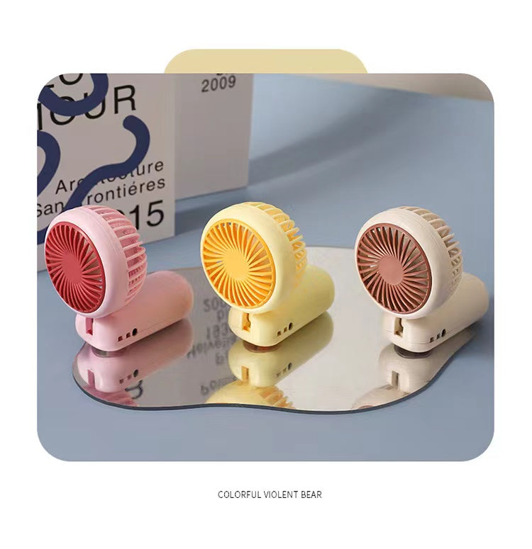 Colorful small fan set in pink, yellow, and orange for easy cooling, ideal for ages 3 and up