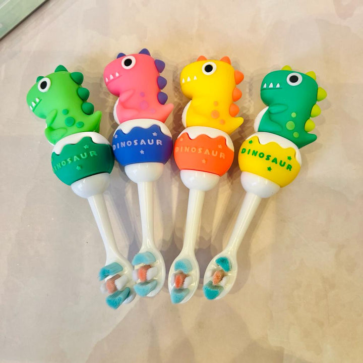 Colorful NIYO TOYS dinosaur soft bristle toothbrush for kids with playful design and easy grip
