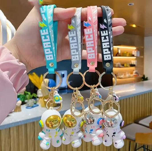 Colorful space keychain with cute astronaut design, perfect for kids age 6+, ideal return gift for parties