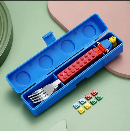Blue lunchbox with a LEGO-themed spoon and a fork for creative play, ideal for kids age 3+